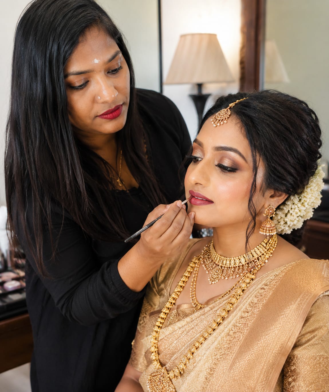 Professional wedding artist blending makeup